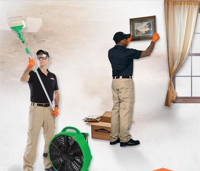 Picture of SERVPRO technicians cleaning 