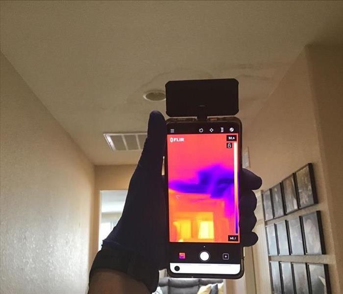 picture of infrared camera showing moisture in the ceiling